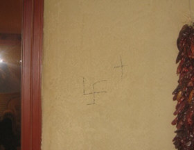 photo of swastika and cross vandalism