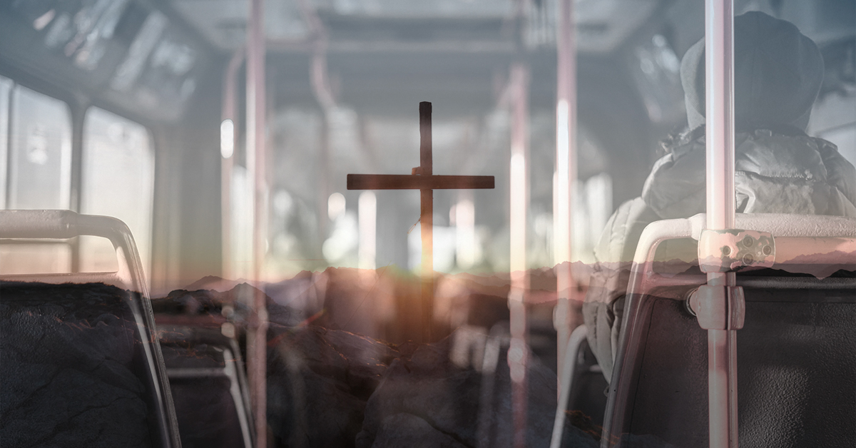 cross image superimposed in the center of a bus