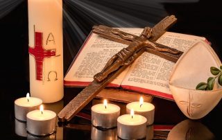 Crucifix Bible and candles