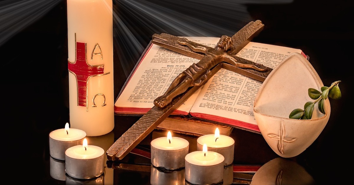 Crucifix Bible and candles