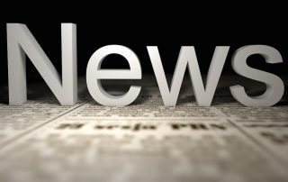 Image of newspaper with the word News