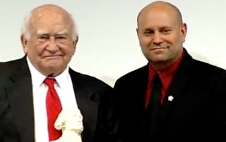 Ed Asner Receiving MRFF's 2010 Thomas Jefferson Award from Mikey Weinstein