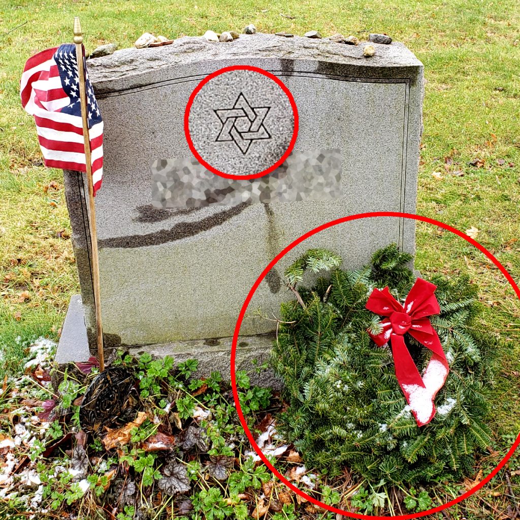 Jewish headstone with Christmas wreath on it. Name obscured by MRFF for anonymity.