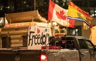 truck with freedom sign at Canadian border protest blockade