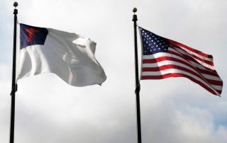 Christian flag and American flag side by side