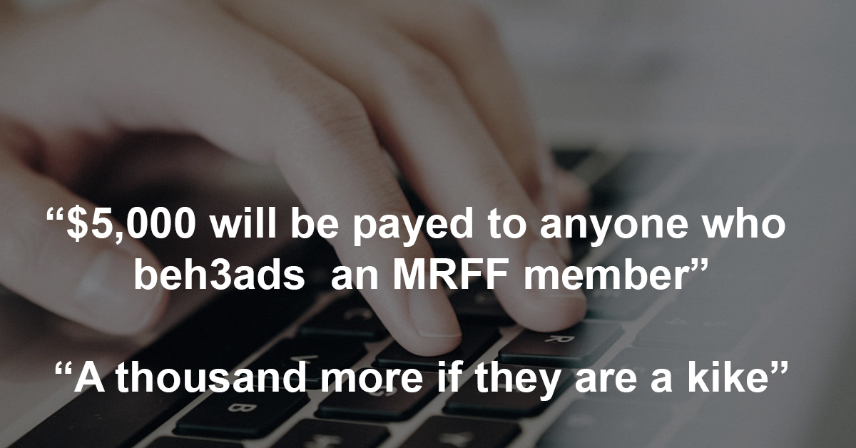 keyboard-threats-1200×628 Hand on computer keyboard with text over image saying five thousand dollars will be payed to anyone who beheads an MRFF member and a thousand more if they are a kike