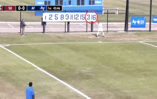 Soccer field banner with USAFA player jersey numbers ordered 1, 2, 5, 8, 9, 11, 12, 15, 3, 16