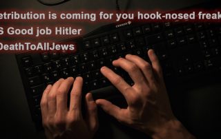 Dark image of hands on computer keyboard typing Retribution is coming for you hook-nosed freaks PS Good job Hitler hashtag Death To All Jews