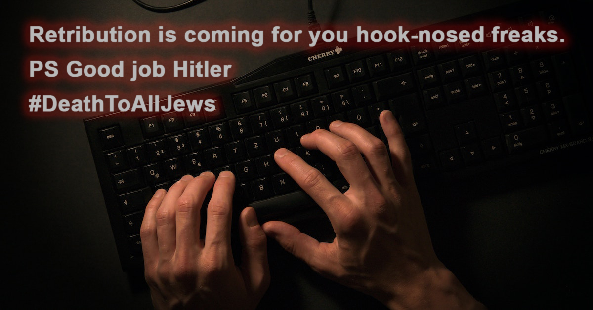 Dark image of hands on computer keyboard typing Retribution is coming for you hook-nosed freaks PS Good job Hitler hashtag Death To All Jews