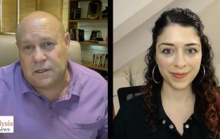 Still shot of Mikey Weinstein and host Talia Baroncelli from interview video