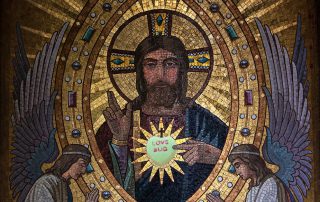 Medieval picture of grim looking sacred heart Jesus with a candy heart that says love bug superimposed over the sacred heart on his chest