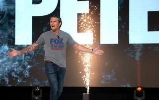 Pete Hegseth on a stage