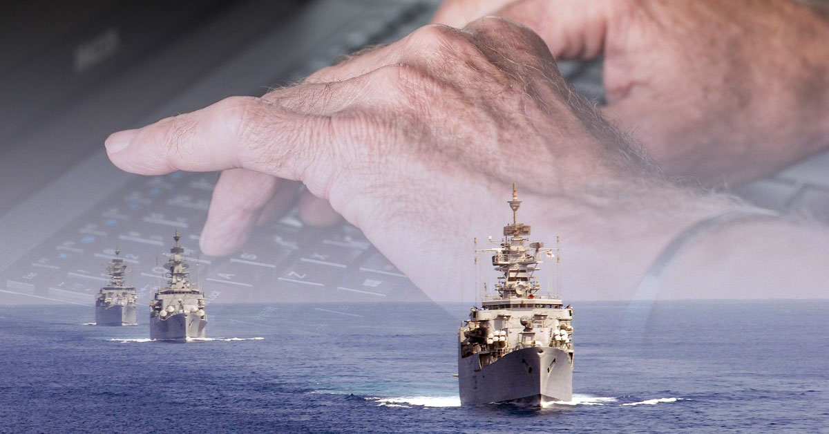 navy-keyboard Hands typing on computer keyboard blended with image of U.S. Navy Ships in the foreground