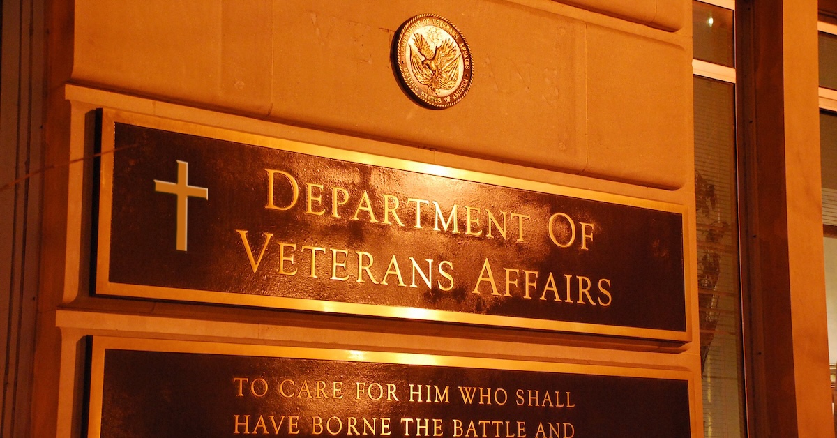 Va Headquarters building sign with christian cross added to it