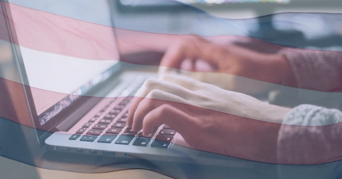 Hands typing on keyboard with transgender flag overlay
