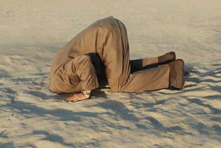 Ostrich-man-head-in-sand